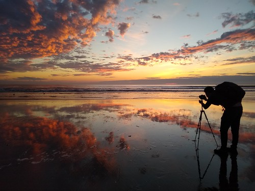 sunset pacific ocean photographer clouds stinsonbeach california winter reflection water tripod