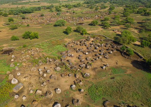 above aerialview africa africanculture anthropology architecture colourimage cultures day developingcountries drone dronepointofview eastcentralafrica granary home horizontal houses huts indigenousculture kapoeta lifestyles namorunyangstate nopeople nonurbanscene outdoors poverty ruralscene simplicity southsudan ssd200742 strawconstruction thatchroof thatchedroof toposa topossa travel tribal tribe village