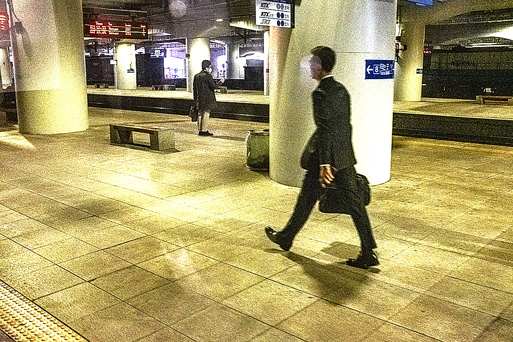 Two men on train platform--Daegu 2