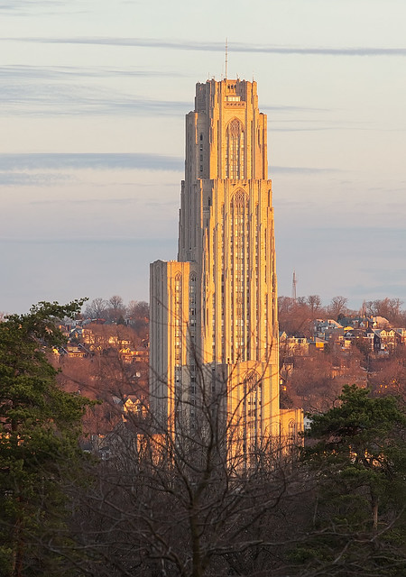 University of Pittsburgh Cathedral of Learning lit by the sunrise.