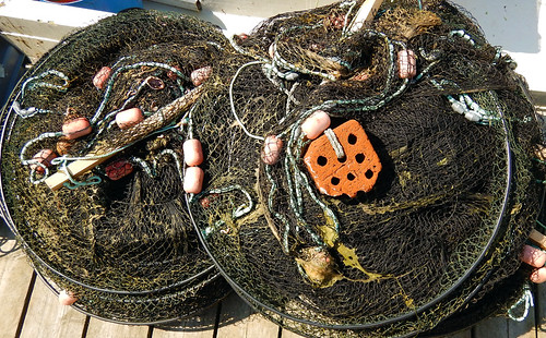Nets and fishing floats on the dock in Grundsund on the Bohuslan Coast of Sweden