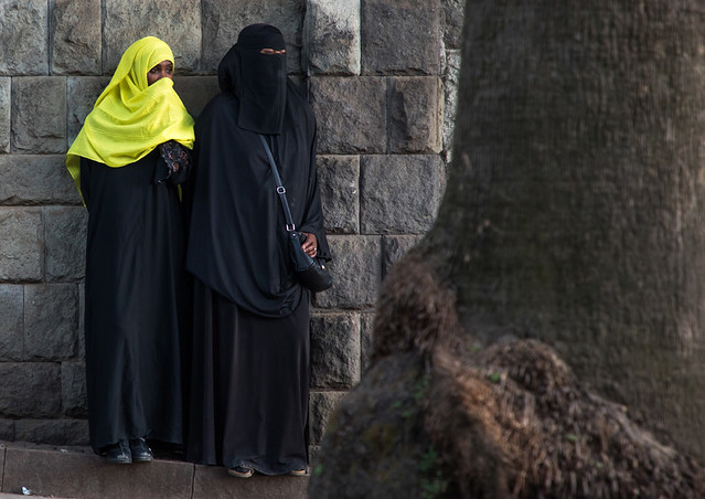 Muslim ethiopian woman in burqa and hijab in the street, Addis Ababa Region, Addis Ababa, Ethiopia