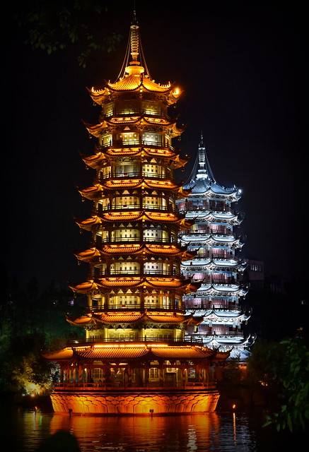Sun and Moon pagodas of Guilin at night, China