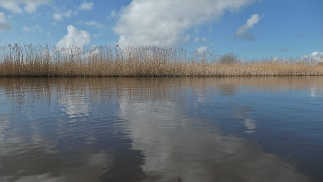 Sunny cloud reflections on Ee, Friesland