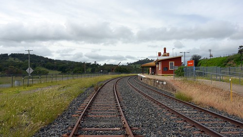 walcharoadrailwaystation nsw australia railway railwaystation countryrailwaystation platform weighbridge loxpix loxwerx l0xpix landscape levelcrossing crane tractor train