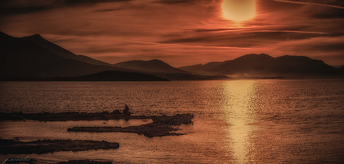 sunset sea greece evia chalkis fisherman