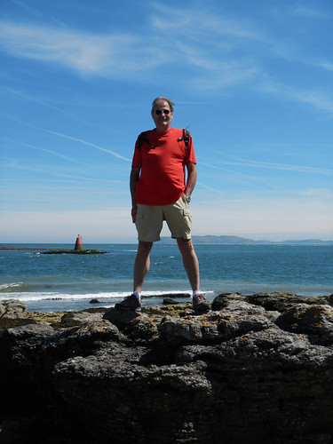 Al standing on a waddle at Black Point at Anglesey Peninsula, Wales