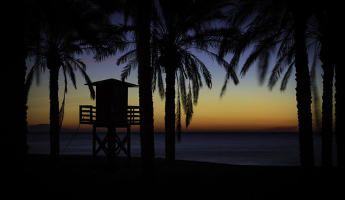 beach sunrise palms costadelsol torremolinos andalusia lifeguardtower spain copyrightfreeimage