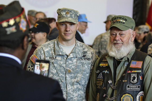 Army Maj. Zach Rolf poses for a photo with his father and Vietnam War veteran, Lynn Rolf