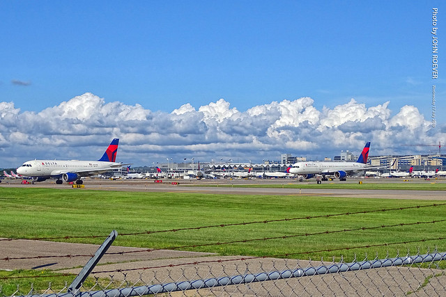 Delta A319 and 757 taxiing at MSP Airport, 17 July 2019