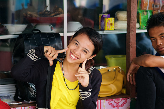 Indonesian girl smiling in a shop at a market in Glodok, the Chinese neighborhood in Jakarta - Java - Indonesia