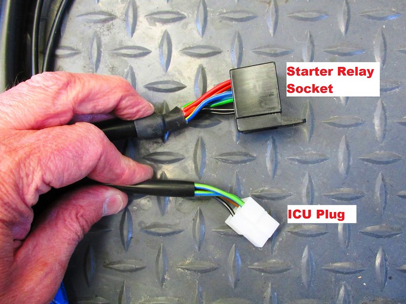Near Voltage Regulator/Starter Relay Bracket: Starter Relay Socket; ICU Plug