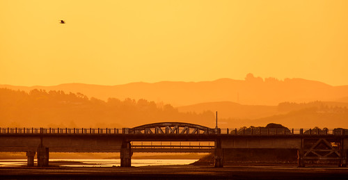 xe3 ahuririestuary sunset ankh water orange light sun tide silhouette bridge napier river fujifilm layers sky clouds dusk caldwell hawkesbay newzealand