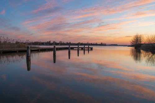 rietplas rene mensen lake reflection rietlanden parcsandur water pier sunset evening nature
