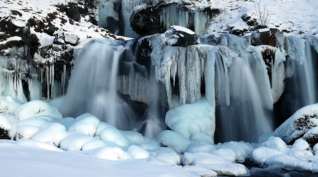 Icy waterfall, winter scene from Iceland