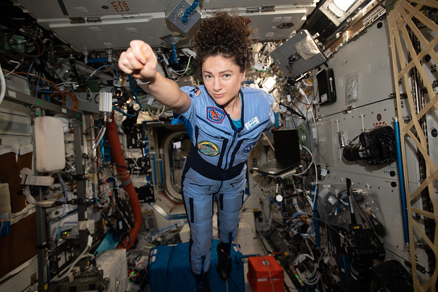 Expedition 62 Flight Engineer Jessica Meir strikes a superhero pose