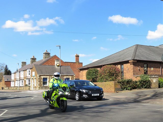 Northamptonshire Police Officers Sgt Keany Funeral Cortege Passing Former Oakham Police Station to pick up close family escorted by police motor cycle outriders