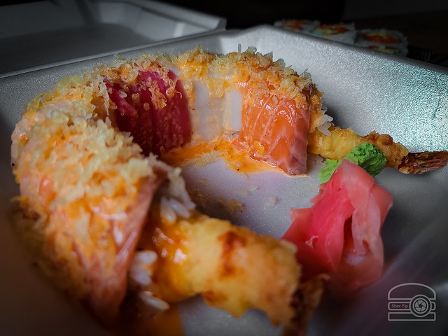 WVU Roll - Shrimp tempura rll, topped w/ salmon, tuna, white fish, crunchies, and Spicy sauce - Ogawa