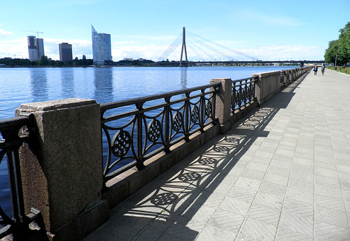 riga latvia europe travel city town urban view landmark street baltic summer river bridge buildings shadow sun