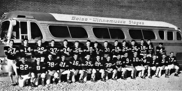 Caldwell Cougars Football Team in 1958 standing against a Boise Winnemucca Stages Bus at Caldwell High School in Idaho