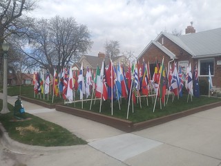 A slew of international flags placed in the front yard of a house on Yale Avenue, Salt Lake City
