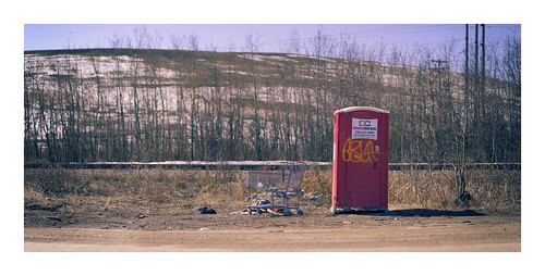 edmonton toilet portable outhouse canada alberta street sanitair working dumping sony 85mm lens spring maybe industrial vanveenjf stock