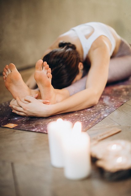 Woman practicing yoga - Credit to https://homegets.com/