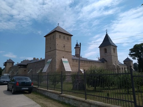 dragomirna monastery church architecture romania motorola dacia logan grass fence garden sky clouds trees g5s