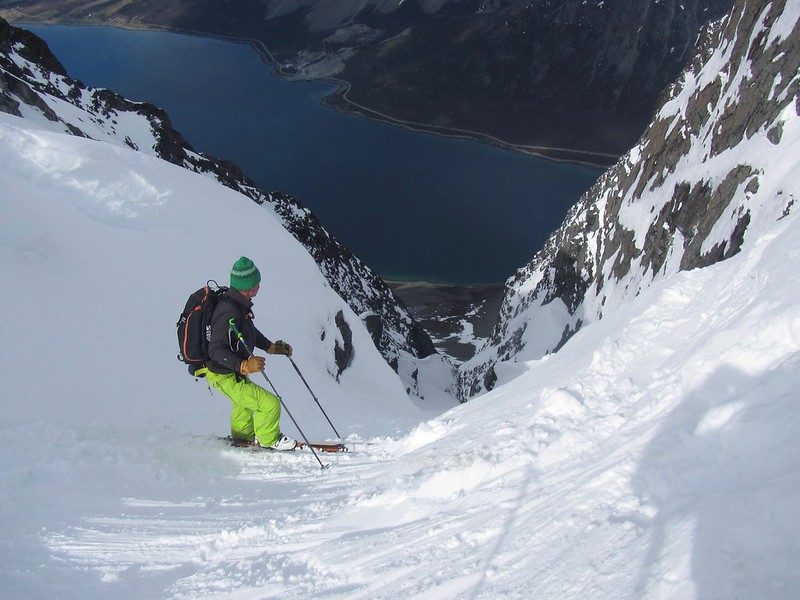 The Godmother of All Couloirs. Forholtinden. Skier: Andy P.  Photo: Pete Barrass