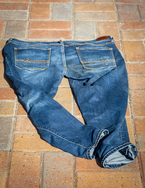 Blue jeans - out to dry on the sidewalk of the old Alden Dow office in downtown LJ. This particular sidewalk has become home for someone, at least for a while.