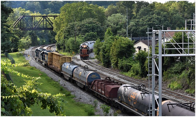 CSX 6529 & 6110 leaving while Wheeling & Lake Erie 3064 is waiting for clearance to move @ Connellsville, PA