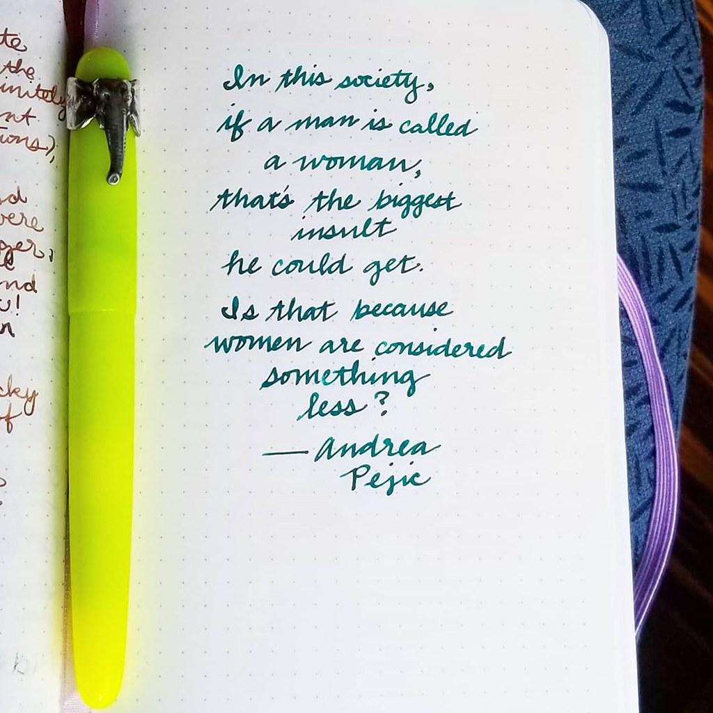 Handwritten quote in cursive with teal ink

