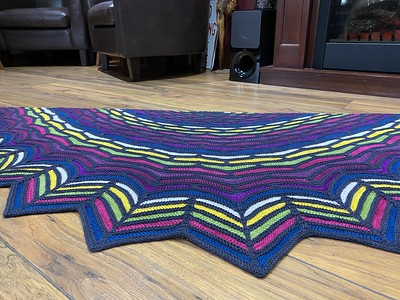 Jen finished her Painted Bricks Shawl by Stephen West! Yarn SweetGeorgia Tough Love Sock in Charcoal and Party of Five in Snapdragon and Honey Fig