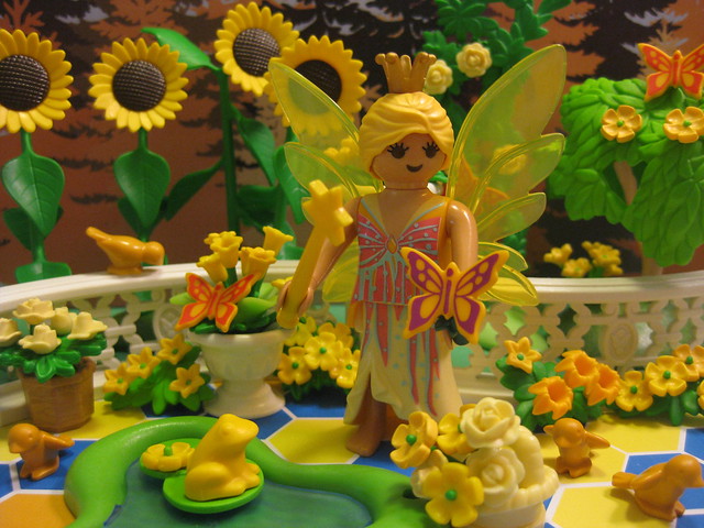 The Yellow Faerie Enjoys her Garden