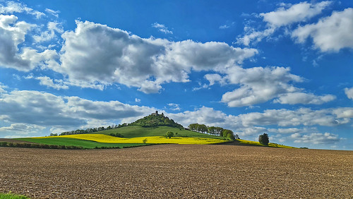 castle castledesenberg castleruine clouds landscape rapefield agriculture ruinedcastle blueskywithclouds burgdesenberg nordrheinwestfalen