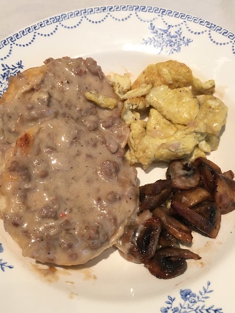 Breakfast anyone? Sausage in gravy on biscuits, scrambled eggs, and mushrooms.