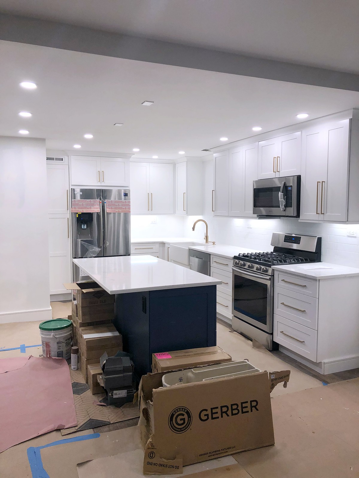 All White Cabinet Install | Before & After: My New York Apartment Kitchen Renovation | 1970s Apartment Small Kitchen Redesign | Living After Midnite Jackie Giardina