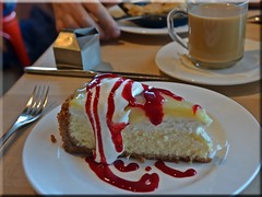 Lemon Cheese Cake With Whipped Cream and Raspberry Coulis