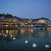 Evening view of old town Rapperswil reflected in the lake Zürich, Switzerland, March 2019