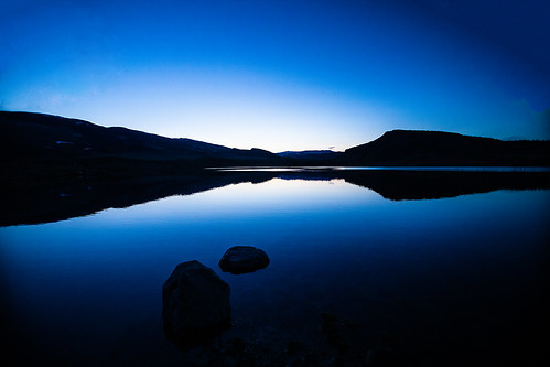 wyoming cody westnewtonlake newtonlakes mountains twilight sky lake reservoir rock reflection silhouette