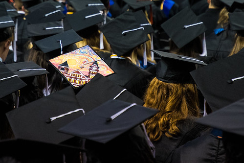 Graduates wearing caps sit in attendance at a past commencement for Auburn University.