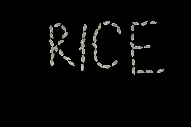 Rice text written with rices isolated on the black background