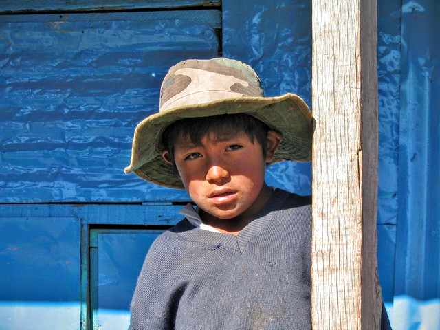 Boy, rural crossroads, Andes, Peru, 2005