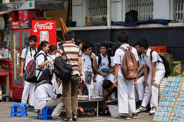 Group of students wearing uniform in Batavia neighborhood in Jakarta - Java, Indonesia