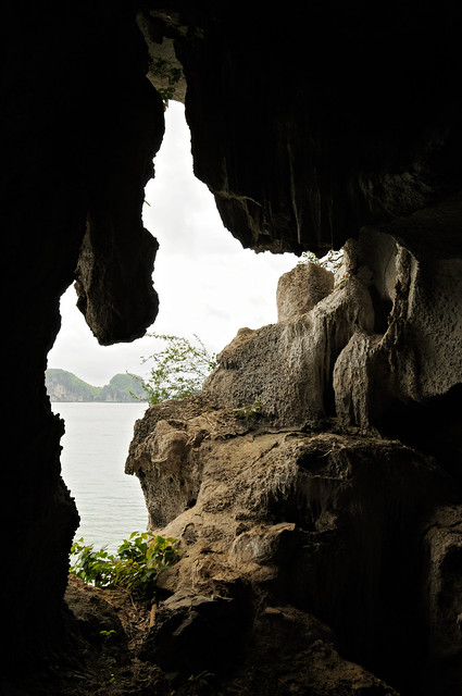 Little cave on an island in Bai Tu Long - Ha Long bay - Vietnam