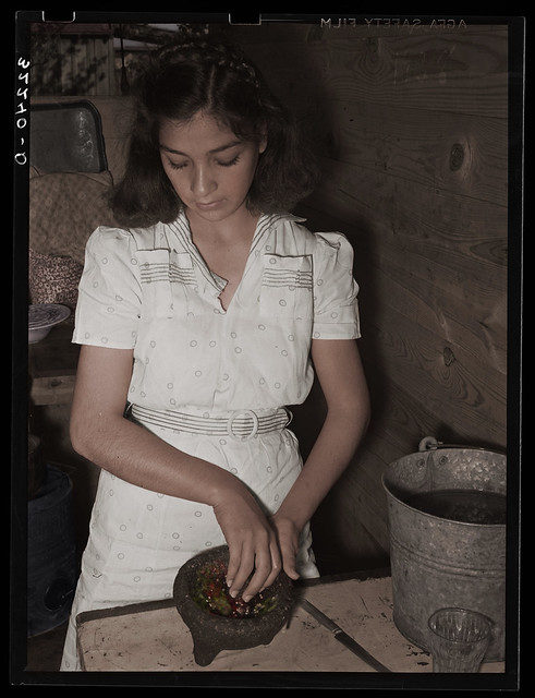 Mexican girl grinding peppers 1937