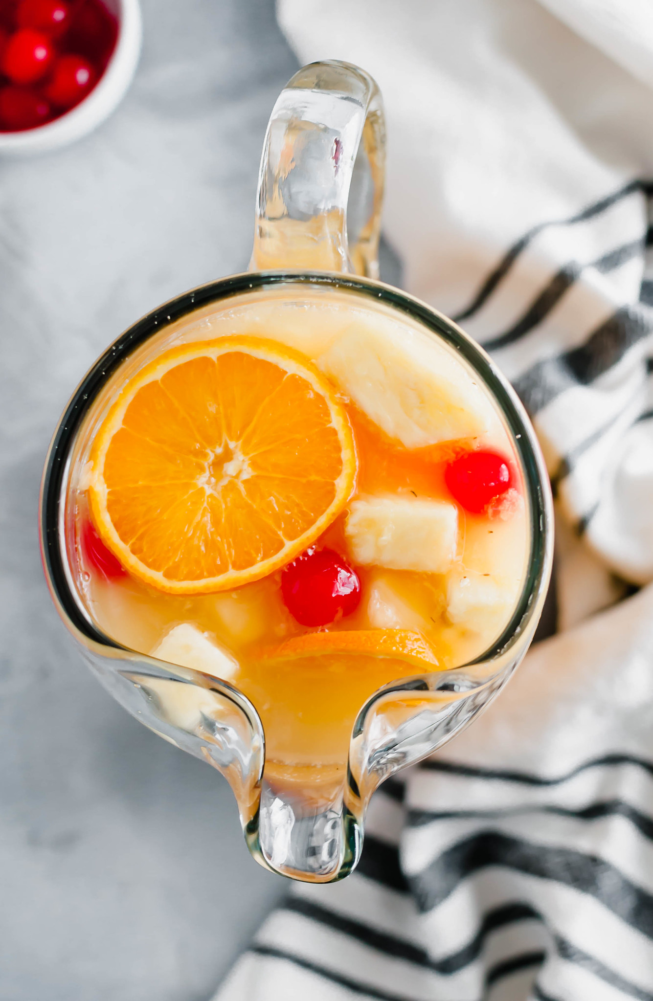 Warm weather calls for this refreshing, tropical Summer Sangria. Sweet moscato wine, tropical juices, coconut rum and delicious fruit meld together to create the tastiest summer drink.