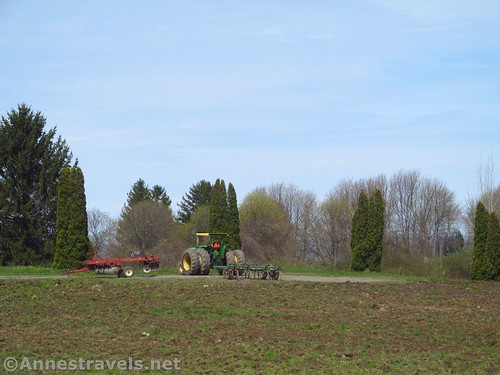 A tractor in a field near Bear Swamp Road, Pultneyville, New York