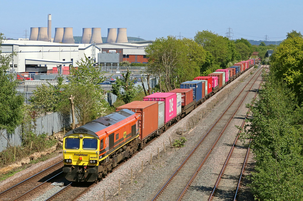 Freightliner 66503 'The Railway Magazine' in Genesee & Wyoming orange and black livery passes Castle Donington on 6.5.20 with 4O95 1218 Leeds F.L.T. to Southampton M.C.T. well loaded  liner