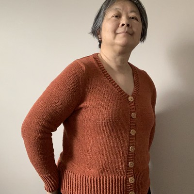 When I took these photos I hadn’t blocked yet but I am happy with my finished Antonia by Cocoknits knit using Berroco Elba. Line Buttons by Katrinkles.
